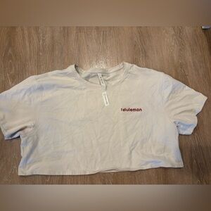 lululemon athletica Cropped Tee in Pale Pink with Maroon Logo